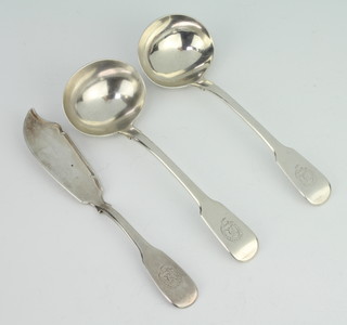A pair of George III silver fiddle pattern ladles, London 1815 with armorial together with a silver butter knife 166 grams