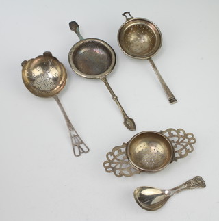 A silver caddy spoon Birmingham 1837, 4 tea strainers 159 grams 
