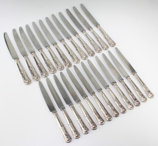 Ten silver handled Kings pattern dinner knives and 10 matching dessert knives 
