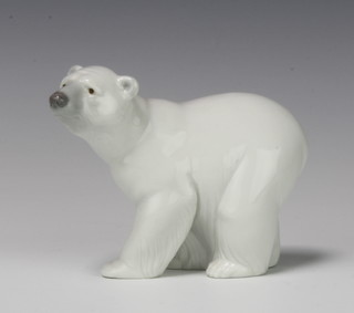 A Lladro figure of a standing polar bear cub 11cm 
