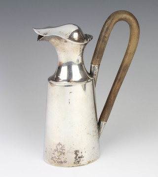 A Continental stylish silver ewer with lid and fruitwood handle, 25cm, 468 grams gross 