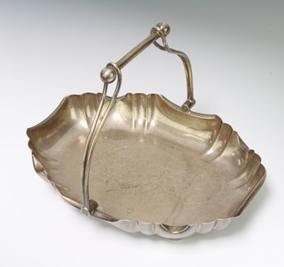 An Edwardian aesthetic silver basket with swing handle, chased with flowers and leaves, Sheffield 1908, maker Walker and Hall, 25cm, 549 grams 