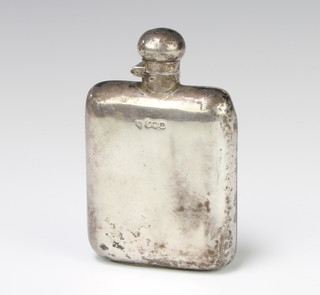 A silver hip flask of plain form, Sheffield 1936, 11cm, maker Goldsmiths and Silversmiths Company, 103 grams 