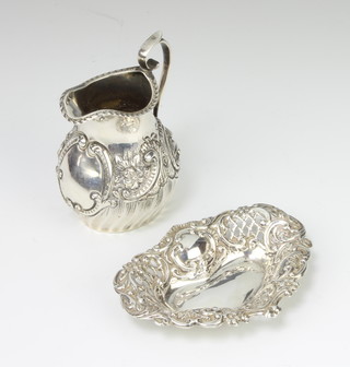 An Edwardian silver repousse cream jug Birmingham 1901, a ditto repousse bon bon dish 10cm, 72 grams 