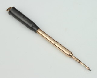 An Edwardian gold plated novelty propelling pencil mounted in a cartridge case 14cm 
