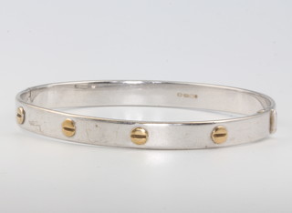 A 9ct white and yellow gold bangle 18.2 grams 