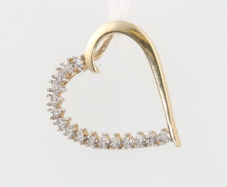 A yellow gold diamond set heart pendant with 16 brilliant cut diamonds 22mm 
