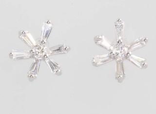 A pair of 18ct white gold baguette diamond floral ear studs 8mm 
