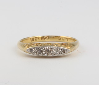 An 18ct yellow gold diamond ring size P 2.7 grams