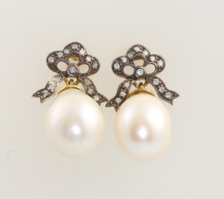 A pair of silver gilt cultured pearl and diamond ear drops 22mm 
