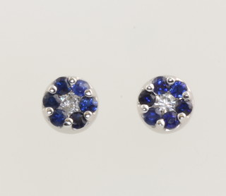 A pair of white gold sapphire and diamond circular ear studs 6mm 