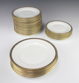 A set of gilt decorated dinnerware retailed by Thomas Goode and Co. comprising 10 small plates 20cm, 24 medium plates 23cm and 11 large plates 25cm