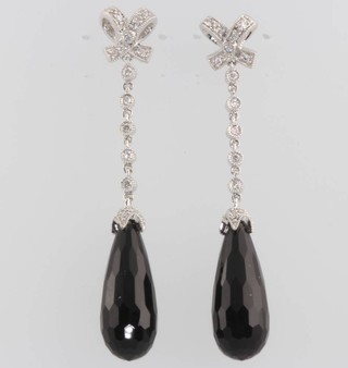 A pair of 18ct white gold faceted black onyx and diamond drop earrings 5cm 