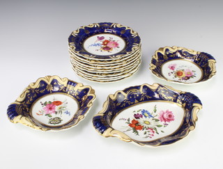 A 19th Century Spode style dessert service with painted spring flowers, pattern 733, enclosed in blue and gilt floral borders comprising 10 plates 22cm, 2 scallop dishes 24cm and a 2 handled dish 29cm 