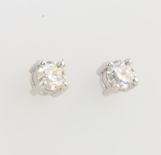 A pair of 18ct white gold single stone brilliant cut ear studs approx. 0.65ct 
