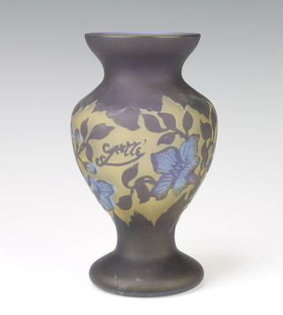 A Galle style carved cameo oviform vase decorated with flowers bearing a signature 19cm 