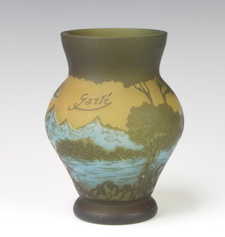 A Galle style carved cameo baluster vase decorated with an extensive landscape bearing a signature 16cm 