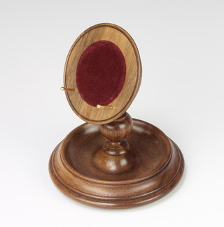 A turned wood pocket watch stand 13cm 