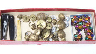 A quantity of military buttons, a seal and decorative buttons