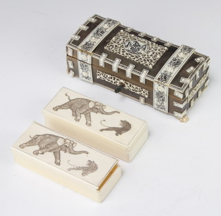 A pair of Japanese Meiji period carved ivory rectangular boxes and lids decorated with an elephant and tiger and an elephant and lion 3cm x 12cm x 4.5cm together with an ivory mounted trinket box 17cm  