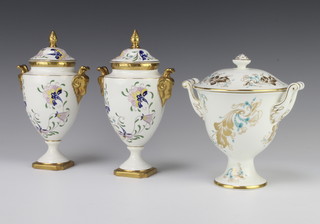 A Coalport 2 handled cup and cover decorated with flowers 17cm, a pair of Coalport urn shaped 2 handled vases and covers with rams head handles 21cm 