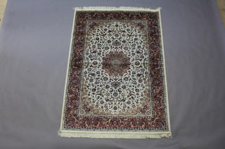 A beige ground Keshan rug 200cm x 140cm