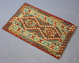 A multi coloured ground Chobi Kilim rug 127cm x 78cm 