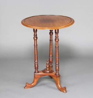A Victorian circular mahogany occasional table raised on 3 turned and outswept supports 68cm x 53cm diam. 