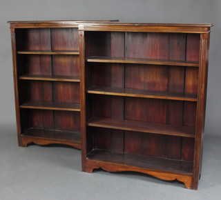 A pair of Victorian mahogany bookcases fitted adjustable shelves raised on platform bases 126cm h x 102cm w x 29cm d 