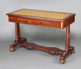 A William IV rectangular mahogany library table with inset leather writing surface, base fitted 2 long drawers with tore handles, raised on standard end supports 74cm h x 115cm w x 54cm d 