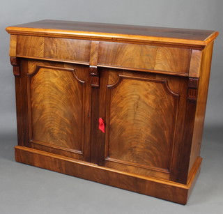 A Victorian mahogany chiffonier fitted 2 drawers above a double cupboard enclosed by panelled doors, raised on a platform base 100cm x 127cm w x 50cm d 