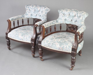 A Victorian mahogany drawing room suite comprising a 2 seat settee and 2 matching armchairs with bobbin turned decoration upholstered in blue sculptured dralon 