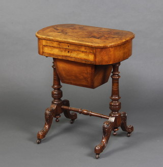 A Victorian inlaid and figured walnut work table with hinged lid, interior fitted a writing slope, the base with 1 drawer and deep basket, raised on turned supports 72cm h x 60cm x 40cm d 
