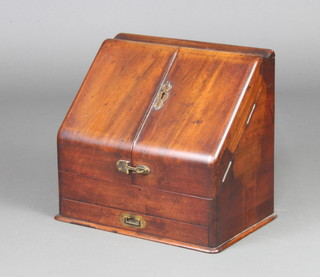 A Victorian mahogany wedge shaped stationery box with stepped interior, the base fitted a secret drawer 30cm h x 33cm w x 22cm d 