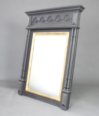 A 19th Century French rectangular plate wall mirror contained in a gilt and black painted frame with moulded cornice and roundell decoration, having turned and fluted columns to the side 127cm h x 97cm w x 12cm d 