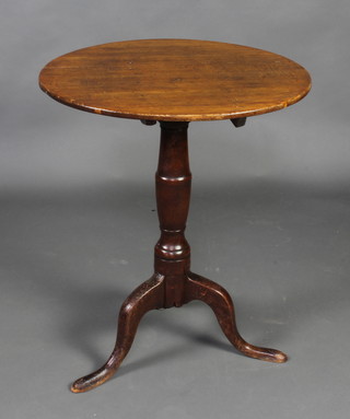 An 18th Century light oak wine table raised on a turned column and tripod base 70cm h x 55cm 