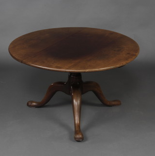 A circular Georgian mahogany tea table (cut down), raised on turned tripod base 43cm x 71cm 