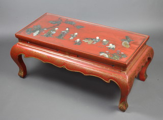 A Chinese rectangular red lacquered and inlaid hardstone coffee table, the top inlaid figures and raised on cabriole supports 43cm h x 96cm x 45cm 