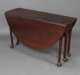 A 19th Century mahogany oval drop flap gateleg dining table raised on 6 club supports 86cm h x 135cm w x 39cm when closed x 144cm when open 