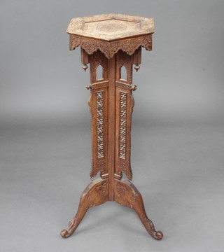 A 19th Century Anglo Indian hexagonal carved and pierced hardwood jardiniere stand raised on cabriole supports 102cm h x 39cm w x 35cm d  