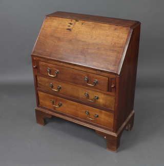 A 19th Century mahogany bureau the fall front revealing a well fitted interior above 3 long graduated drawers with brass swan neck drop handles 95cm h x 75cm w x 38cm 