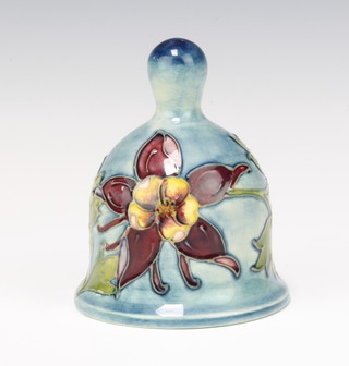A modern Moorcroft bowl decorated the columbine pattern on a pale blue ground 11cm 