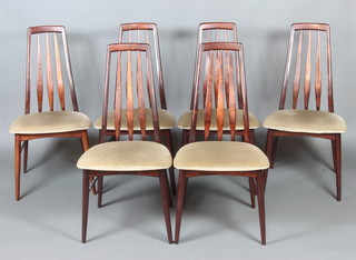A set of 6 Danish 'Eva' design rosewood dining chairs with upholstered seats by Niels Koefoed for Koefoed's Hornslet complete with Cities certificate 582418/01 

