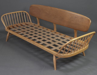 A mid 20th Century Ercol beech and elm studio couch day bed 75cm h x 207cm w x 74cm d