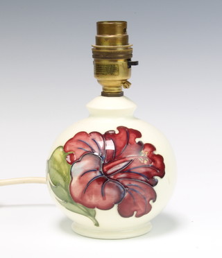 A modern Moorcroft baluster lamp decorated red hibiscus pattern on a cream ground 11cm 