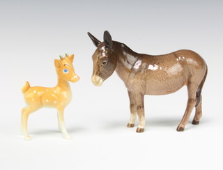 A Beswick figure of a donkey, grey gloss, 12cm, ditto Babycham deer 9cm 