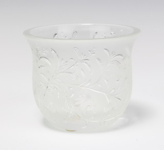 A Lalique candle holder, the frosted ground decorated with scrolling flowers, signature in lower case, 8cm 

