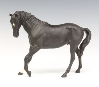 A Beswick figure of a race horse, black matt, 17cm 