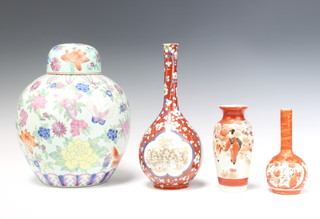 A 19th Century Japanese Imari bottle vase decorated with panels of flowers and bamboo 25cm, a Kutani baluster bottle vase decorated flowers 15cm, ditto baluster vase decorated figures 15cm and a 21st Century Chinese famille rose style ginger jar and cover 21cm