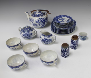 A Japanese tea set comprising a bulbous teapot, sugar bowl, cream jug, 4 tea cups, 6 saucers, 6 plates together with 2 condiments and a dish 